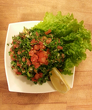 Tabbouleh salad 
(peeled tomatoes, parsley, onion, bulgur, pomegranate sauce and olive oil) - 300 g.